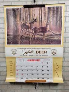 lot 454 image: 1993 Schells Beer Wall Calendar - New Ulm, MN - Approx. 31 x 42 - Features Autumn Solitude by Artist J. Kennedy