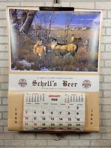 lot 457 image: 1988 Schells Beer Wall Calendar - New Ulm, MN - Approx. 31 x 42 - Features Woodland Wanderers by Artist Michael Sieve