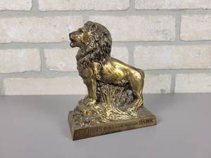 lot 494 image: Diecast Lion Coin Bank Harris Trust & Savings Bank - Harris, MN