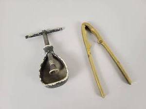 lot 482 image: Vintage Screw Type Nut Cracker and Solid Brass Claw  Nut Cracker