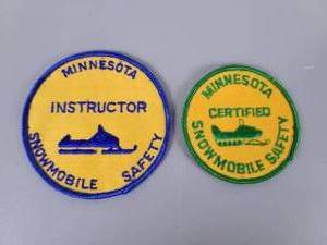 lot 472 image: (2) Vintage Snowmobile Safety Patches