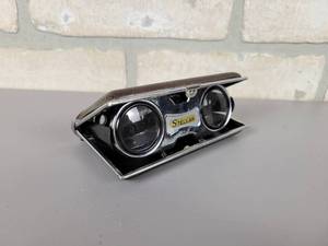 lot 491 image: Vintage Stellar 2.5x Folding Compact Binoculars - Made in Japan