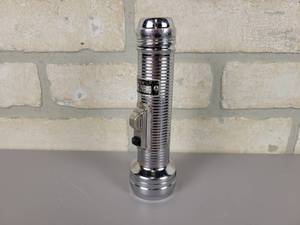lot 444 image: Vintage Bright Star Yellow Lens Metal Flashlight