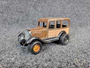 lot 349 image: Vintage Tootsie Toy Ford Model A Woody Toy Car