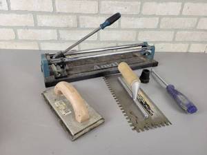 lot 1111 image: ANVIL Tile Cutter and Trowels