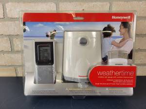 lot 1328 image: NEW Honeywell Wireless Rain Gauge and Thermometer - Model TC150