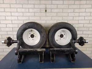 lot 1004 image: (2) NEW Torsion Axles w NEW Rims & Tires - 5-Bolt - 2700LB Capacity - NO SHIPPING