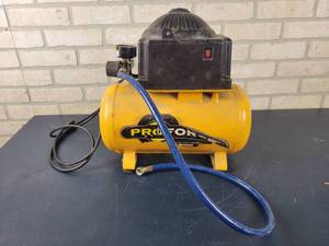 lot 1379 image: Powermate 20Gallon Air Compressor - Builds Pressure, dont hear any leaks - NO SHIPPING
