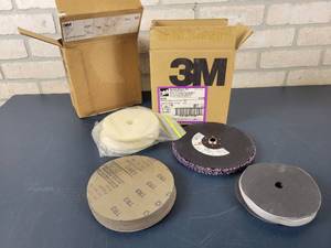 lot 1397 image: Large Lot of Sanding Discs and More - Includes (50) 6 400 Grit, (50) 5 40u Microfininshing and (5) 3M Clean and Strip Discs  Assorted Buffing Pads