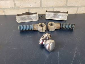 lot 1434 image: (2) Halogen Utility Lights, Suicide Knob and Bike Pegs