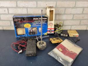 lot 1442 image: Radio Shack CB Radio, Dusk to Dawn Outside Automatic Light, TV Tube Tester and More