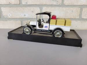 lot 693 image: 1916 UBC Studebaker Pickup Diecast Model