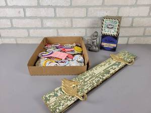 lot 697 image: (2) Vintage Softballs in Original Boxes, Collectable Pins, Ice Cram Mold and Cast Iron Horse Hooks