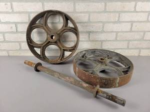 lot 568 image: (2) Antique Cast Iron Wheels and Axle - NO SHIPPING