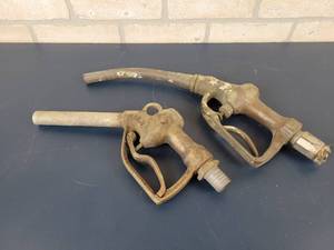 lot 766 image: (2) Antique Brass Gas Pump Handles
