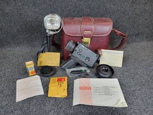 lot 631 image: Vintage Eumig 125 XL Video Camera with Extra Lens and Acme-Lite 800XL Movielite