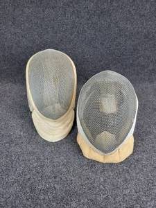 lot 652 image: Pair of Vintage Fencing MasksHelmets -  One marked Santelli