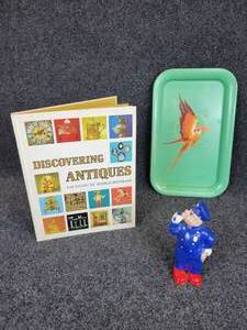lot 668 image: Vintage Irwin Wind Up Police Officer Toy, Discovering Antiques and Metal Tray with Parrot