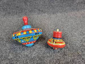 lot 748 image: Pair of Tin Litho Whistling Tops