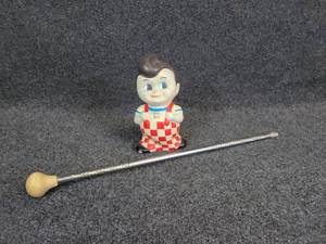 lot 751 image: Vintage Big Boy Coin Bank and Baton