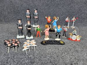 lot 754 image: Lot of Vintage Cake Decorations - Graduation, Band, Dancers with Records, and a Fisherman