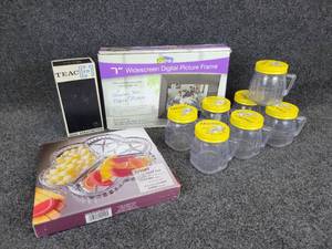 lot 757 image: Lot of Housewares - (7) Osterizer Mini Blend Containers, Digital Picture Frame, TEAC E-1 Head Demagnetizer, and Glass Dish