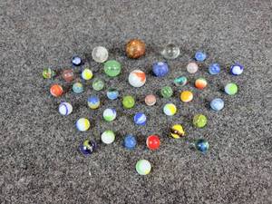 lot 830 image: Lot of (40) Vintage Marbles - Clay, Handmade, and MORE