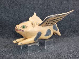 lot 883 image: Carved Wood Flying Pig