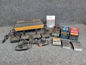 lot 506 image: Atari 2600 Video Computer System with (4) Joysticks, (2) Paddles, and (18) Games