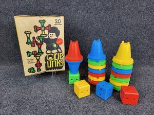 lot 994 image: Vintage Cup Links by Mattel