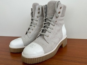 lot 7 image: Pair of Chanel Beige Lace Up Boots