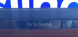 lot 22 image: Insignia 56 Inch TV with Stand