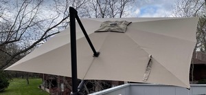 lot 19 image: Large Adjustable Patio Umbrella with Stand