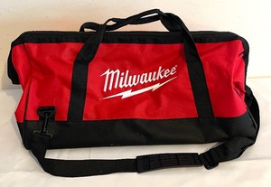 lot 193 image: Milwaukee Tools Duffle Bag, 7-14 Circular Saw and Finish Nailer with Nails