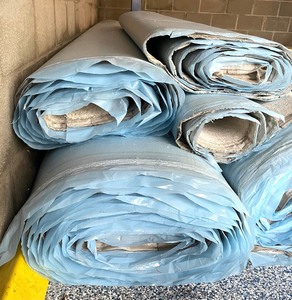 lot 239 image: Rolls and Rolls of New Carpet