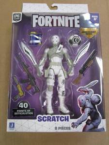lot 411 image: Fortnite Legendary Series Scratch 6-inch Highly Detailed Figure with Harvesting Tools, Weapons, and Back Bling