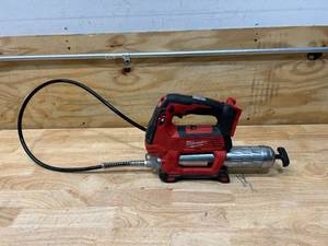 lot 24 image: MILWAUKEE M18 18V Lithium-Ion Cordless Grease Gun 2-Speed (Tool-Only)