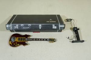 lot 13 image: Axe Heaven Jerry Garcia Signature Tiger Mini Guitar Replica