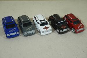 lot 183 image: Hot Wheels Car Tunerz Alpine Car Audio Cadillac Escalade Trucks
