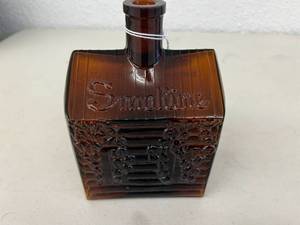 lot 66 image: Smokine Figural Whiskey Bottle