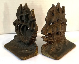 lot 132 image: Pair of Vintage Ship Themed Metal Bookends