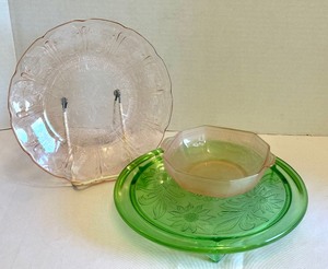 lot 134A image: Pink Depression Cherry Blossom Plate and Green Depression Embossed Sunflowers Footed Cake Plate