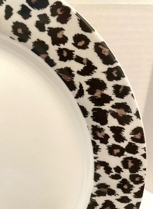 lot 326 image: Nicole Miller Snow Leopard Dishware Grouping
