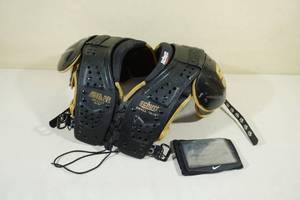 lot 95 image: Schutt Small Football Shoulder Pads with Arm Band Play Book Holder