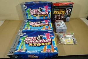 lot 104 image: Assorted Games -Scene It, Dance Dance Revolution, Dominoes, Uno