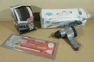 lot 108 image: Corded Car Vacuum Cleaner, 26 Bike Tire, Spray Gun Cleaner