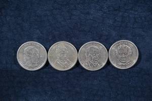lot 152 image: 4 US Presidential Dollar Coins - Tyler, Harrison, Polk, Taylor
