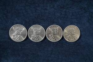 lot 154 image: 4 US Sacagawea Dollar Coins