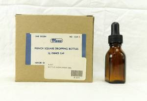 lot 101 image: Box of 12 Vintage Merco Mercer Glass 15ML Amber Colored French Square Dropping Bottles
