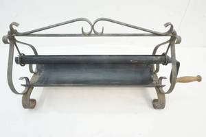 lot 55 image: Newspaper Log Roller